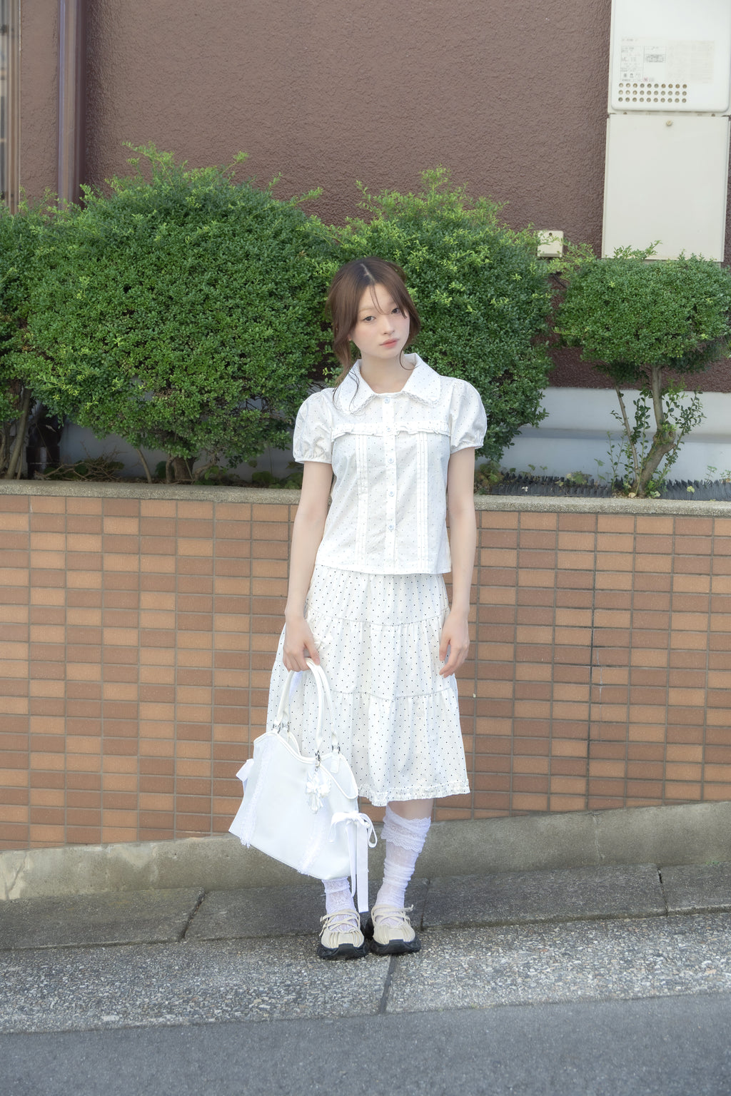 wing frill blouse