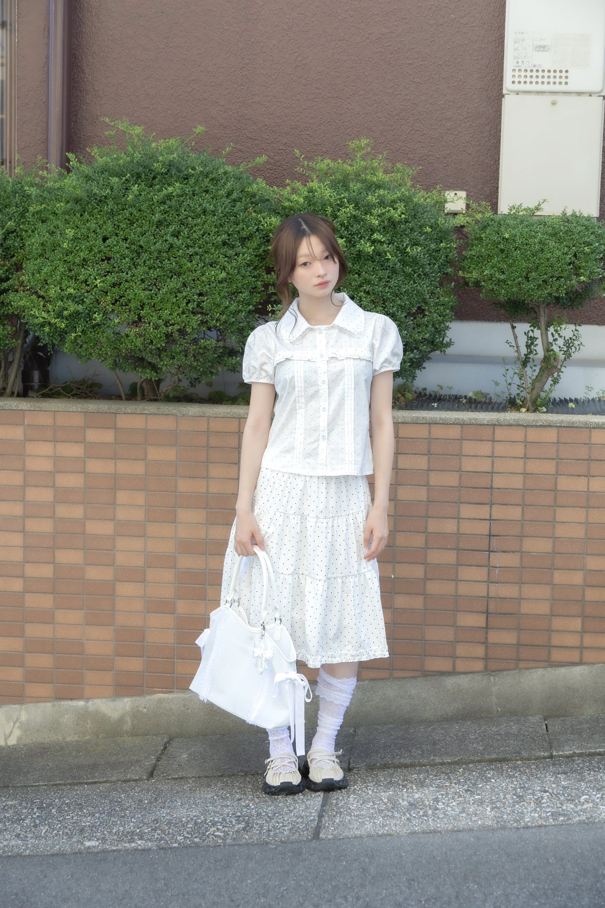wing frill blouse